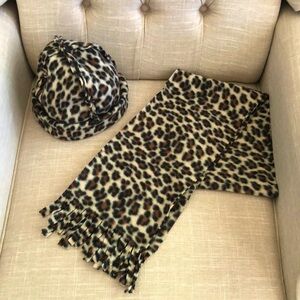 Girls matching leopard beanie and scarf.